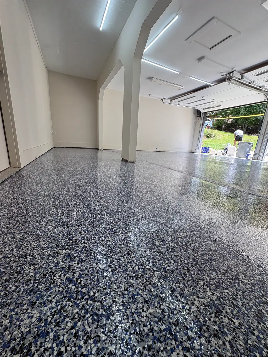 Finished flake epoxy garage floor after prep and coating